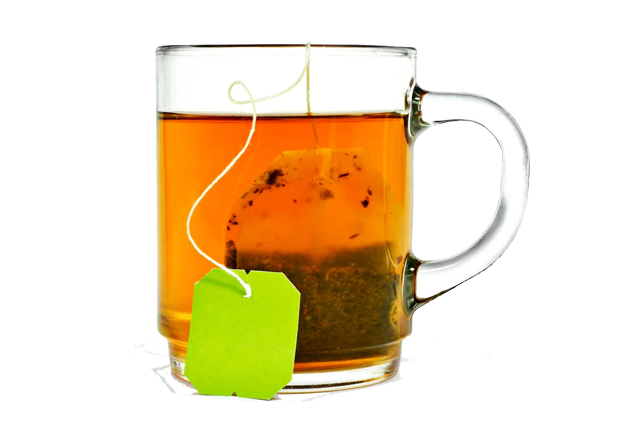 Glass of tea with tea bag.